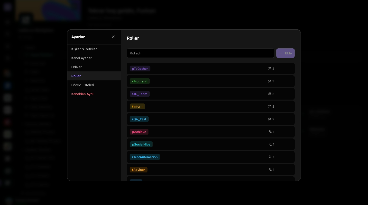 The Huddin room list with role tag pills gating access to specific rooms